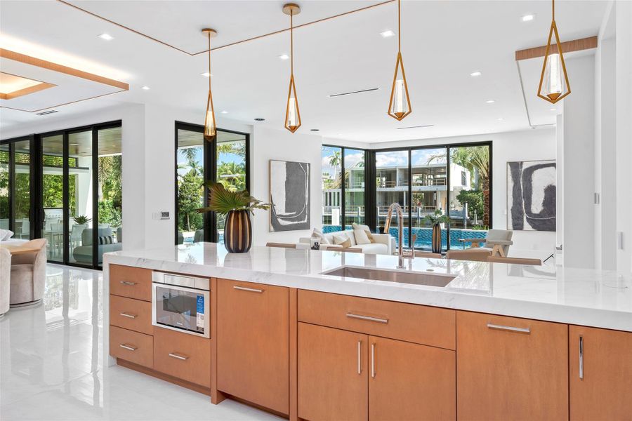 a cozy sitting area, and a butler’s kitchen for extra prep and storage.