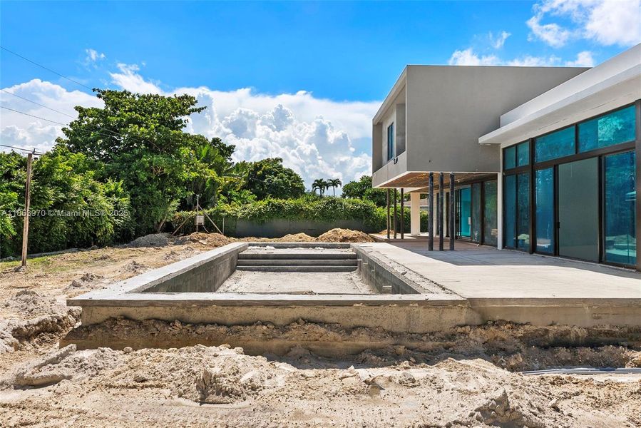 Front exterior of a new home in , Pinecrest, FL, highlighting curb appeal (Image 32). Front exterior of a new home in , Pinecrest, FL, highlighting curb appeal (Image 32).