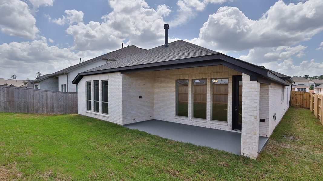 Exterior details and patio area of a home in Grand Central Park, Conroe (Image 2). Exterior details and patio area of a home in Grand Central Park, Conroe (Image 2).