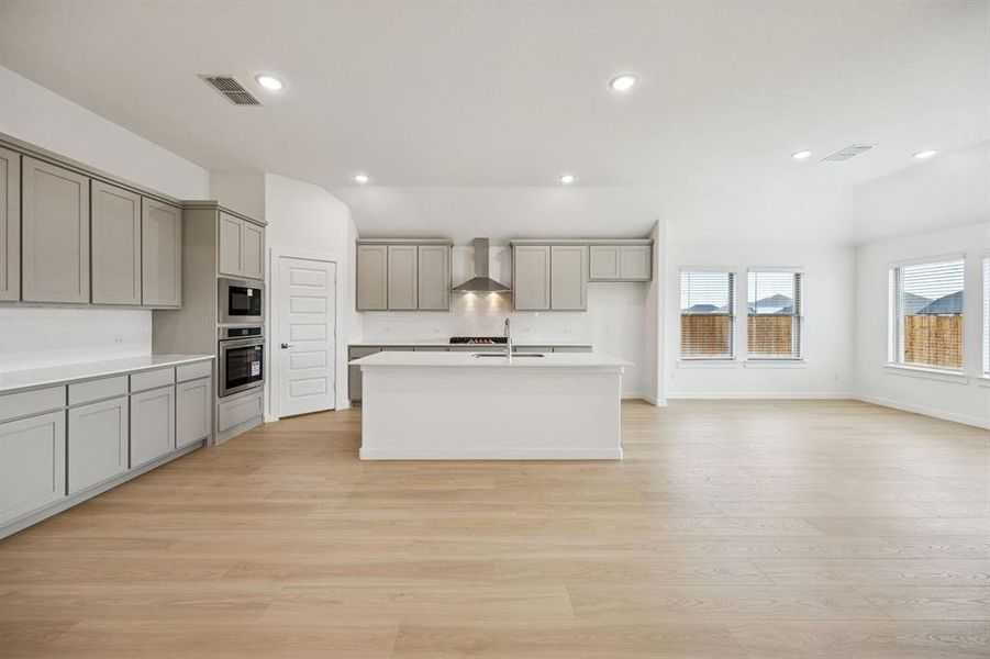 Kitchen in the Gilmour II home plan by Trophy Signature Homes – REPRESENTATIVE PHOTO