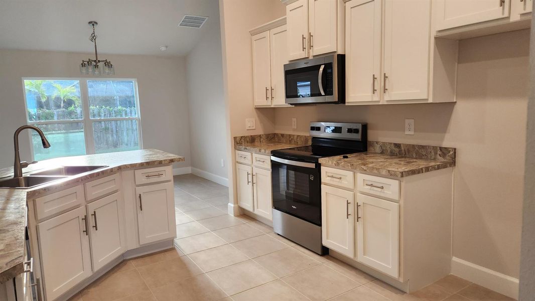 Furnished interior view inside a new home in Gatlin, Port St. Lucie (Image 7).