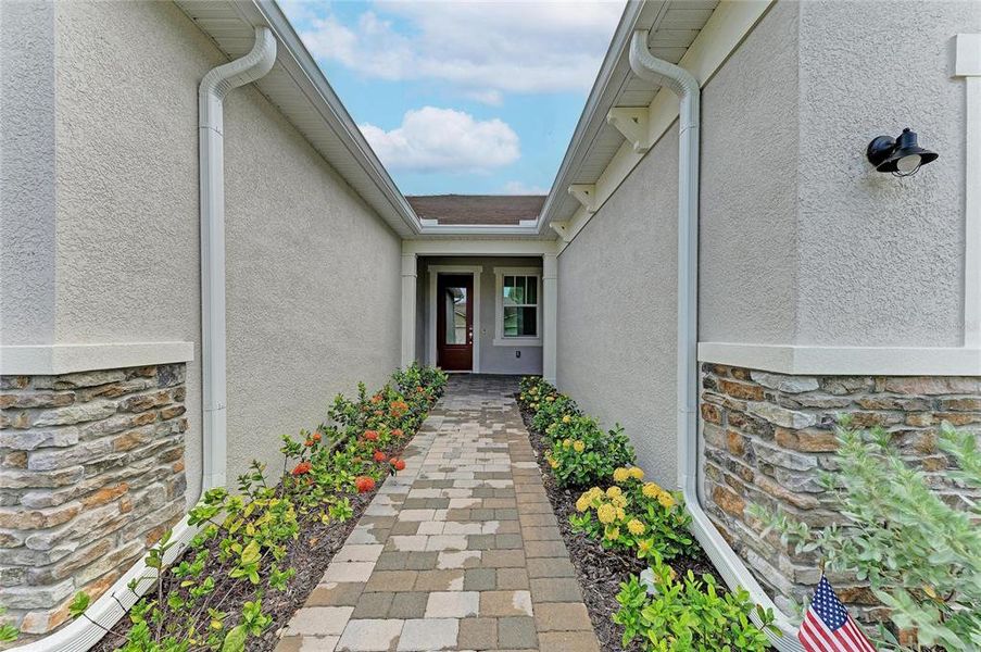 Exterior details and patio area of a home in Wellen Park, Venice (Image 35).