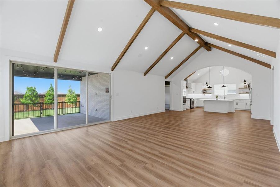 Vaulted ceiling with exposed wood beams Vaulted ceiling with exposed wood beams