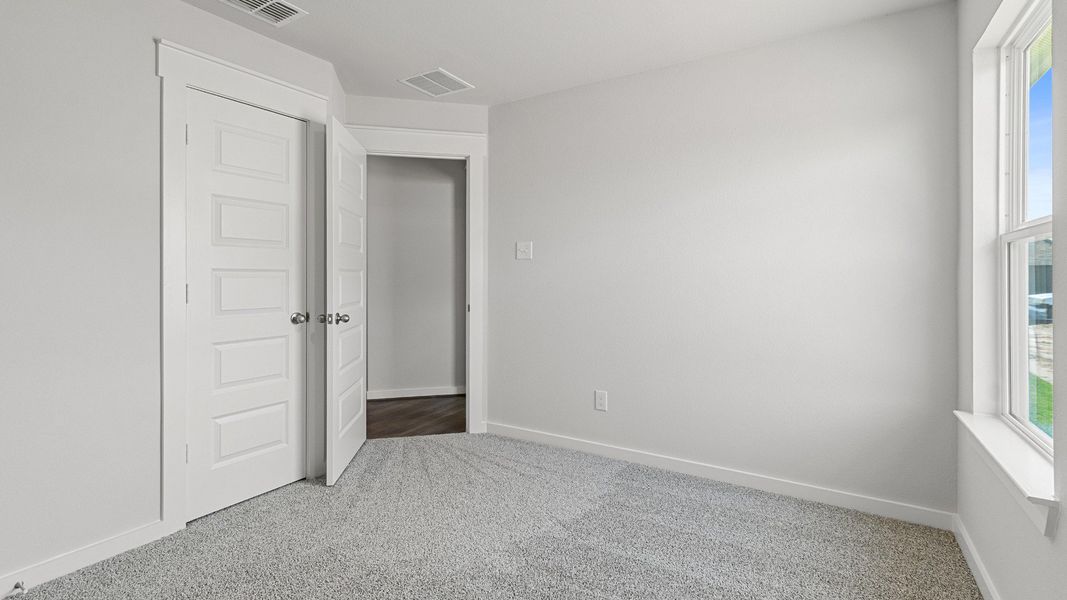 Representative furnished interior of a home built from the Kimbell by Brightland Homes in Cielo, Conroe (Image 13).