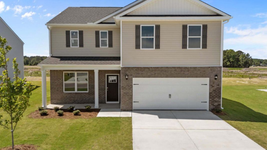 Front exterior of a new home in East Ridge, Ayden, NC, highlighting curb appeal (Image 2).