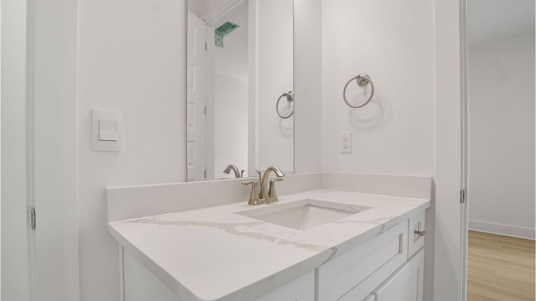 Representative furnished interior of a home built from the Magnolia by D.R. Horton in Breakfast Point East Phase II, Panama City Beach (Image 15).