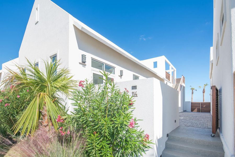 Exterior details and patio area of a home in , Port Aransas (Image 18).