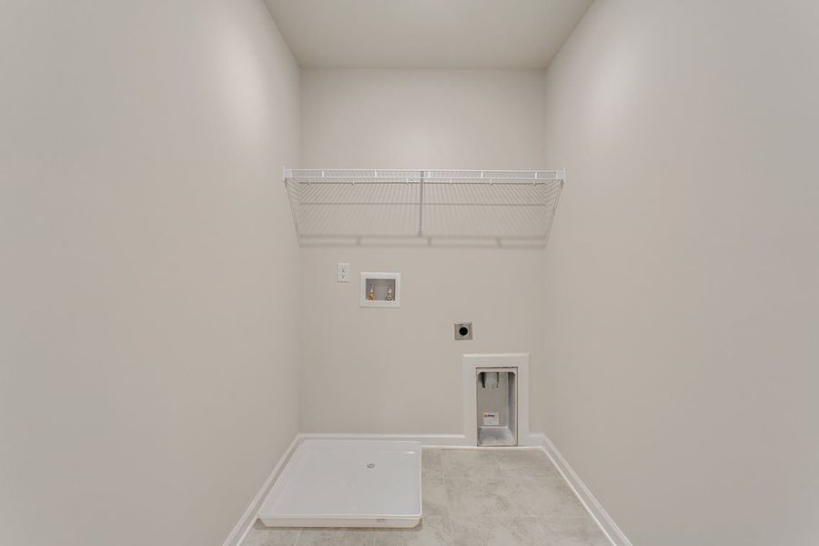 A white room with a white wall.