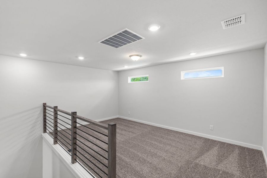Spacious, unfurnished interior of a new home in The Meadows at Hunters Ranch, San Antonio (Image 25).