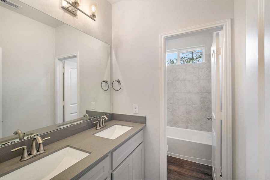 Furnished interior view inside a new home in Deer Pines, Conroe (Image 3).