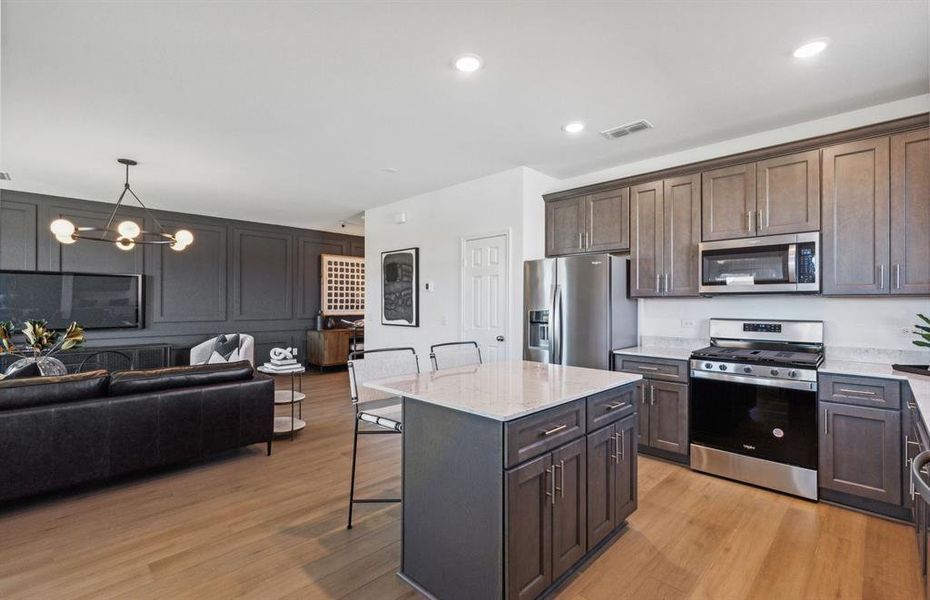 *Model Representation - Large island overlooking gathering room and dining areas *Model Representation - Large island overlooking gathering room and dining areas