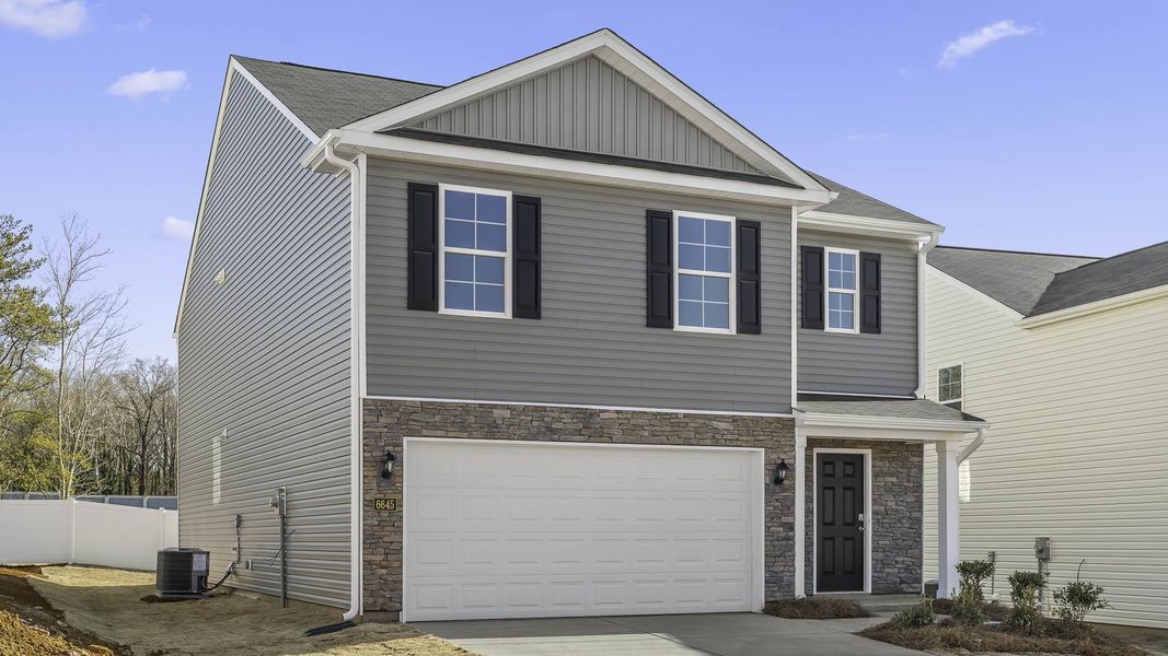 Front exterior of a new home in Willow Mill, Thomasville, NC, highlighting curb appeal (Image 15).