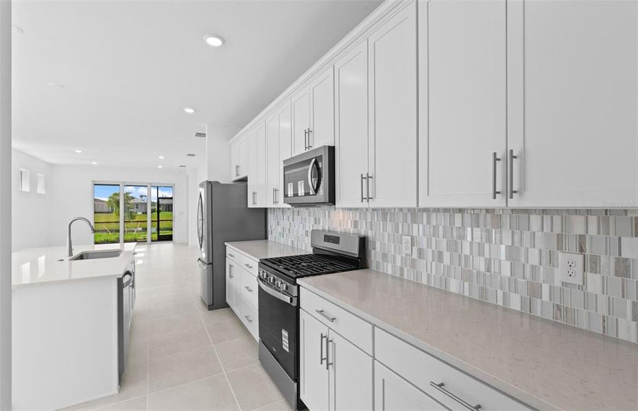 Furnished interior view inside a new home in BeachWalk by Manasota Key, Englewood (Image 9). Furnished interior view inside a new home in BeachWalk by Manasota Key, Englewood (Image 9).