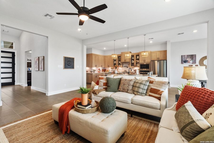 Furnished interior view inside a new home in Village at Three Oaks, Seguin (Image 17).