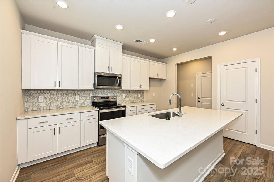 Furnished interior view inside a new home in Buffalo Ridge, Newton (Image 3).