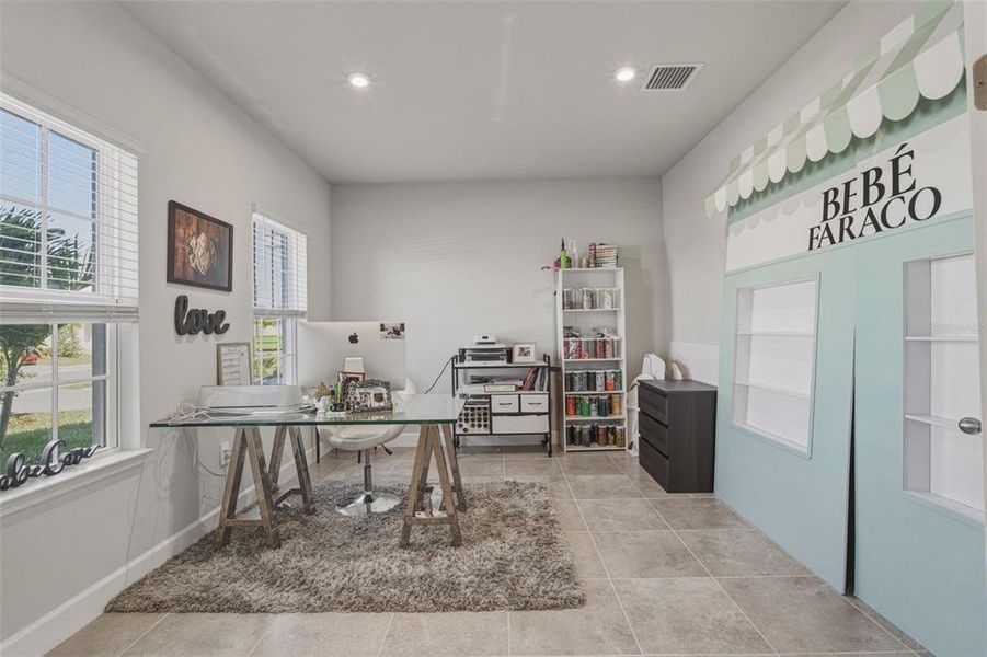 Furnished interior view inside a new home in West Port Single Family Homes, Port Charlotte (Image 6).