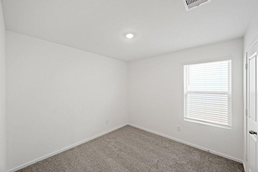 Spacious, unfurnished interior of a new home in Bridges on Lake Houston Villas, Humble (Image 15).