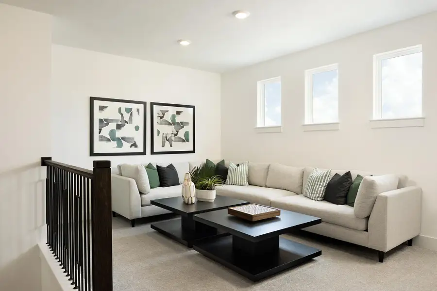 Representative furnished interior of a home built from the Kodee by Risewell Homes in Freedom at Anthem, Mountain City (Image 5).