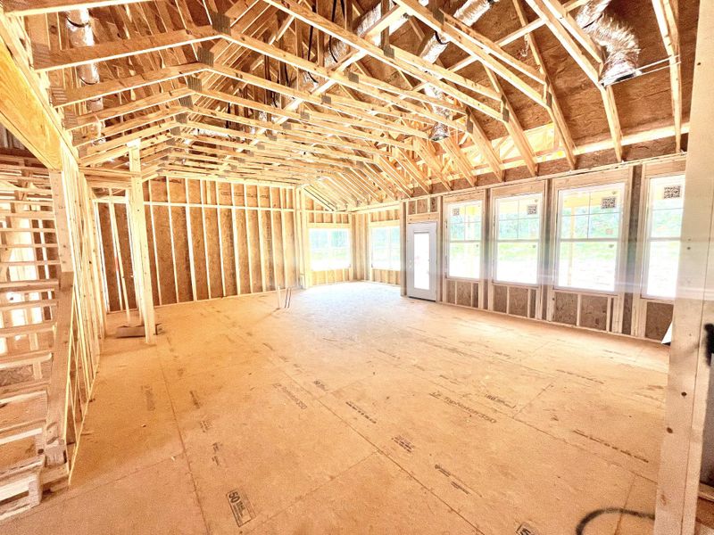 Looking across the great room into the future kitchen, you cannot help but notice wall of windows and the 11 1/2 foot tall ceiling Looking across the great room into the future kitchen, you cannot help but notice wall of windows and the 11 1/2 foot tall ceiling