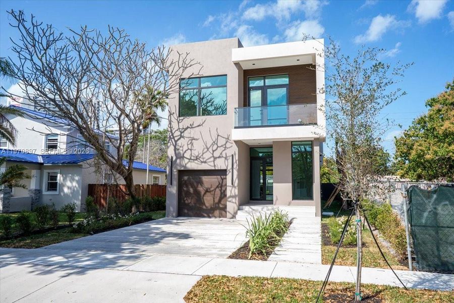Front exterior of a new home in , Hollywood, FL, highlighting curb appeal (Image 1). Front exterior of a new home in , Hollywood, FL, highlighting curb appeal (Image 1).