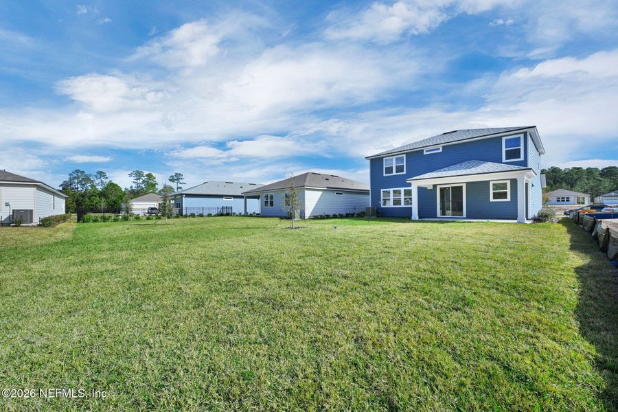 Exterior details and patio area of a home in Hyland Trail, Green Cove Springs (Image 22).