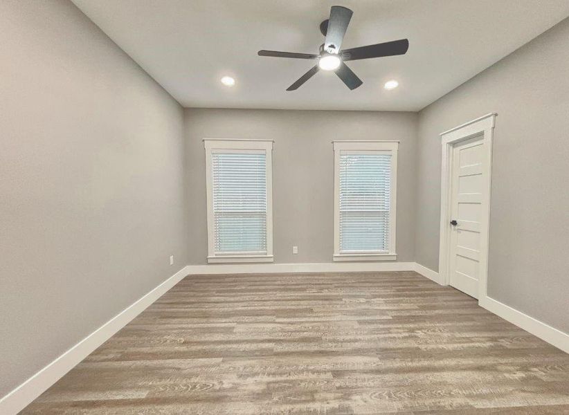 Spare room with light wood-style flooring, recessed lighting, and ceiling fan Spare room with light wood-style flooring, recessed lighting, and ceiling fan