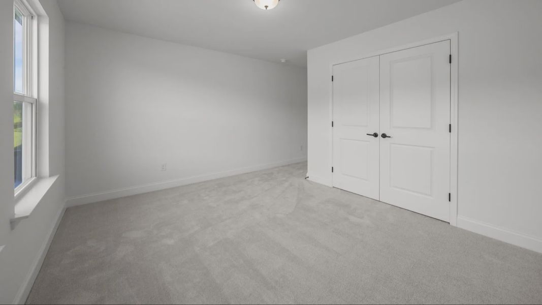 The Norris Plan by DRB Homes in McBride Indian Trail, NC - Bedroom 2 The Norris Plan by DRB Homes in McBride Indian Trail, NC - Bedroom 2
