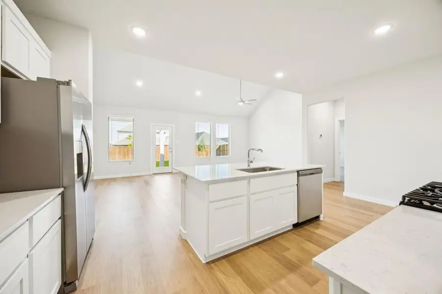 Kitchen in the Masters home plan by Trophy Signature Homes – REPRESENTATIVE PHOTO Kitchen in the Masters home plan by Trophy Signature Homes – REPRESENTATIVE PHOTO