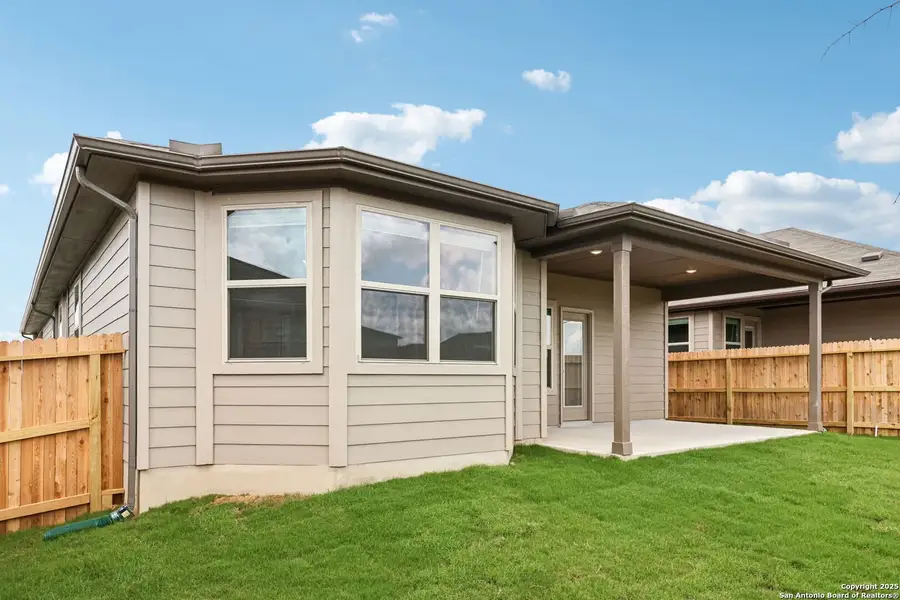 Front exterior of a new home in , Cibolo, TX, highlighting curb appeal (Image 1). Front exterior of a new home in , Cibolo, TX, highlighting curb appeal (Image 1).