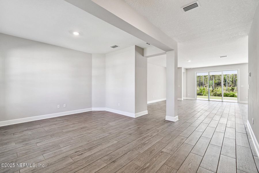 Spacious, unfurnished interior of a new home in Tributary 70', Yulee (Image 23).
