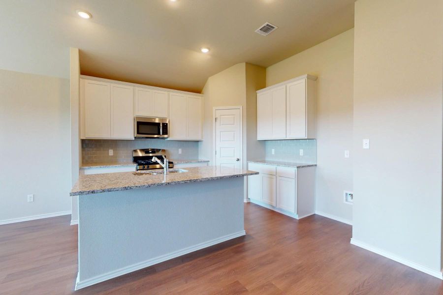 Furnished interior view inside a new home in Carillon, Manor (Image 10).