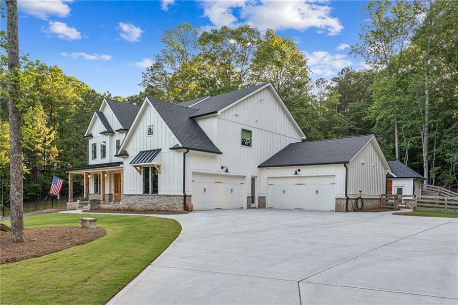 Front exterior of a new home in , Gainesville, GA, highlighting curb appeal (Image 30). Front exterior of a new home in , Gainesville, GA, highlighting curb appeal (Image 30).