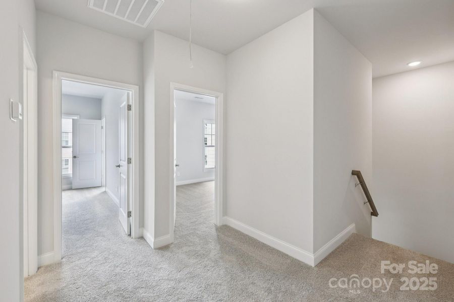 Spacious, unfurnished interior of a new home in Walk23, Huntersville (Image 24).