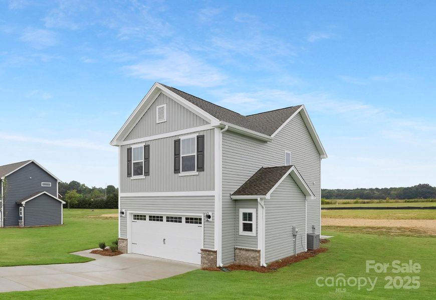 Front exterior of a new home in , New London, NC, highlighting curb appeal (Image 22).