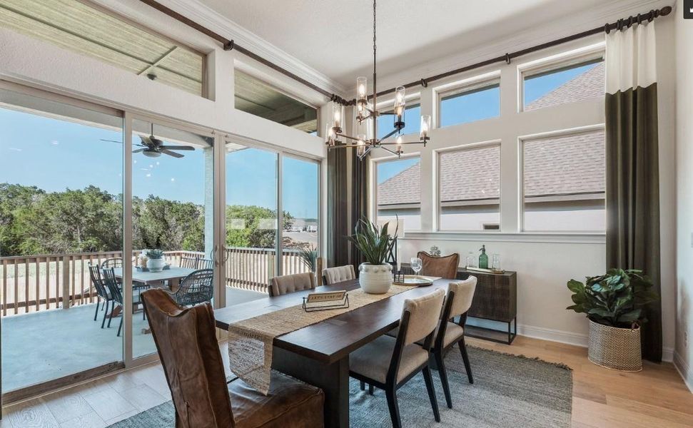 REPRESENTATIVE PHOTO: Beautiful dining area with 12 ft ceilings and stacking sliding glass door and lots of light! REPRESENTATIVE PHOTO: Beautiful dining area with 12 ft ceilings and stacking sliding glass door and lots of light!