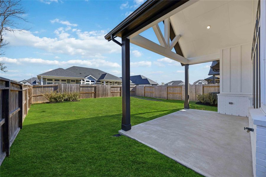 Exterior details and patio area of a home in Sienna, Missouri City (Image 3). Exterior details and patio area of a home in Sienna, Missouri City (Image 3).