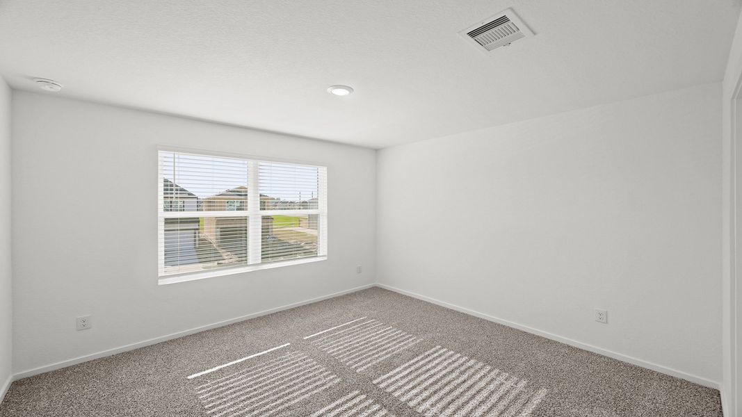 Spacious, unfurnished interior of a new home in Bridges on Lake Houston Villas, Humble (Image 7).