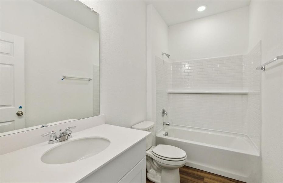 Upgraded secondary bathroom *real home pictured