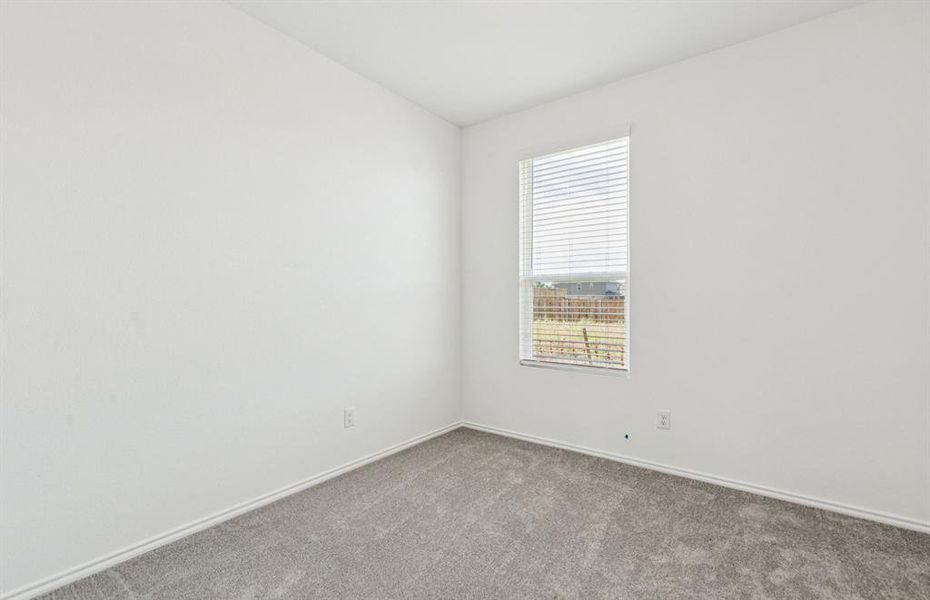 Spacious secondary bedroom with large windows *real home pictured Spacious secondary bedroom with large windows *real home pictured