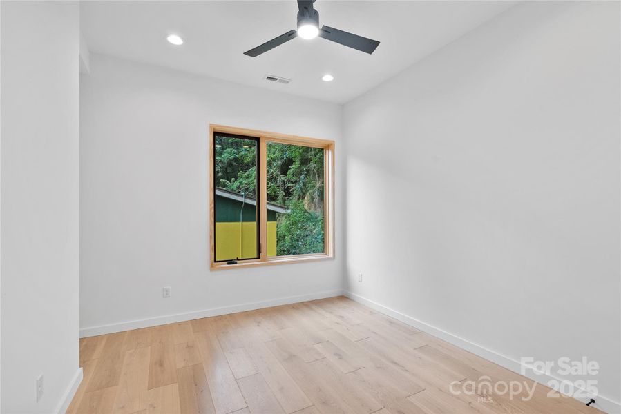 Spacious, unfurnished interior of a new home in , Asheville (Image 13).