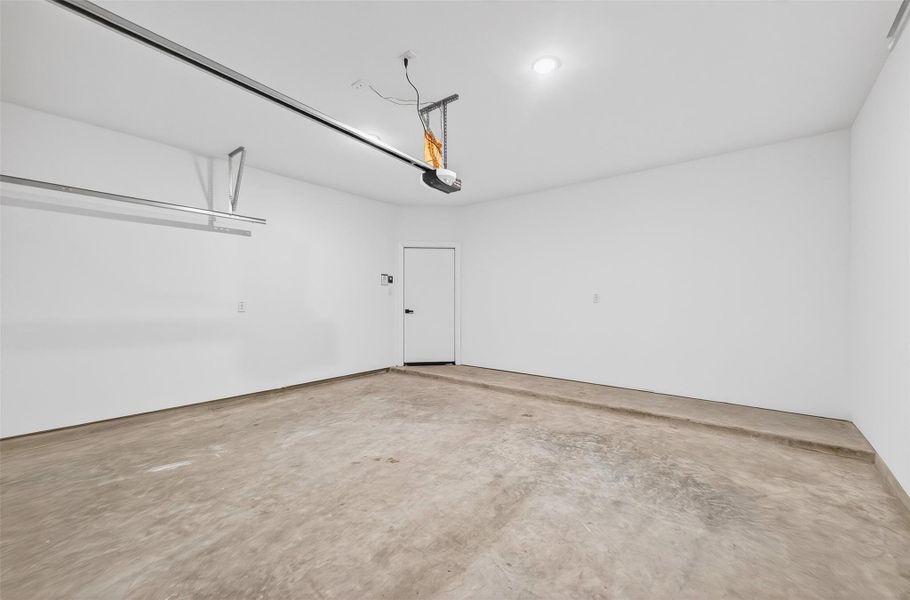 Garage entrance near foyer as you enter the house. Easy access to the alarm panel