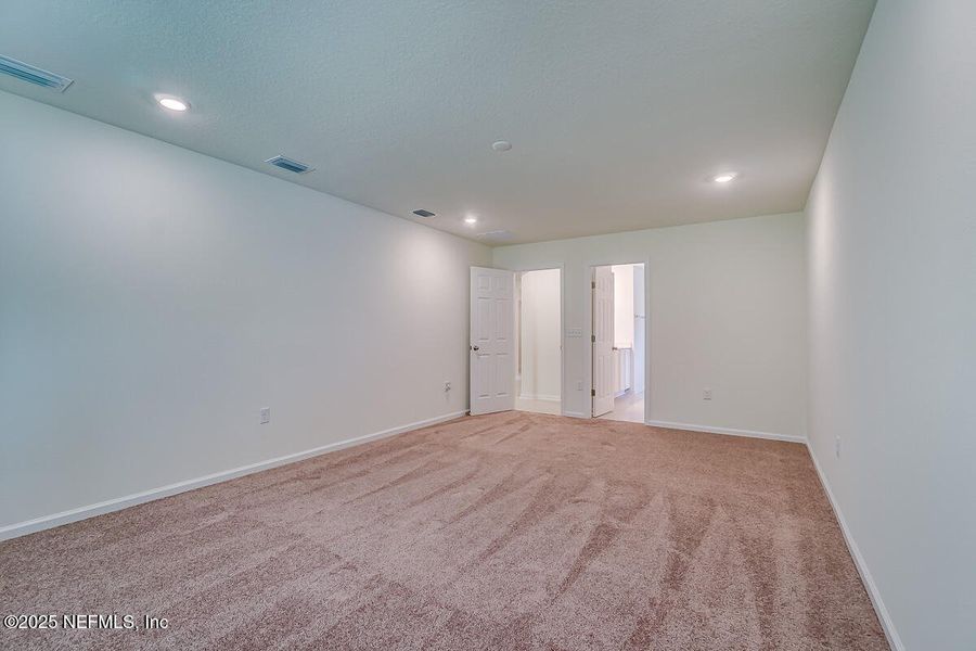 Spacious, unfurnished interior of a new home in Anabelle Island - Classic Series, Green Cove Springs (Image 15).