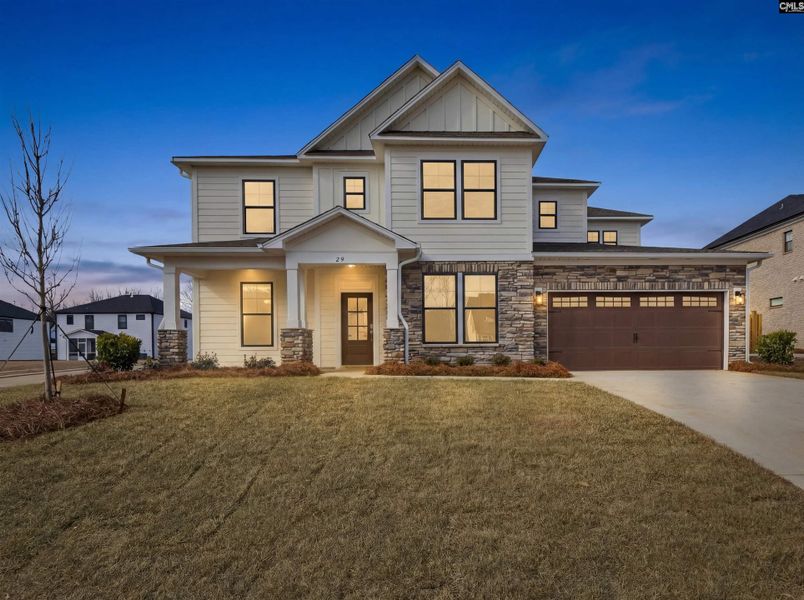 Front exterior of a new home in Collins Cove, Chapin, SC, highlighting curb appeal (Image 31).
