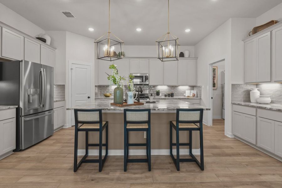 Representative furnished interior of a home built from the Tobias by Chesmar Homes in The Crossvine, Forney (Image 8).