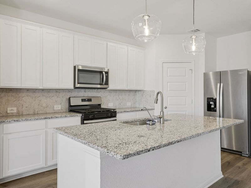 Furnished interior view inside a new home in Big Sky Ranch - Reserve Collection, Dripping Springs (Image 3).