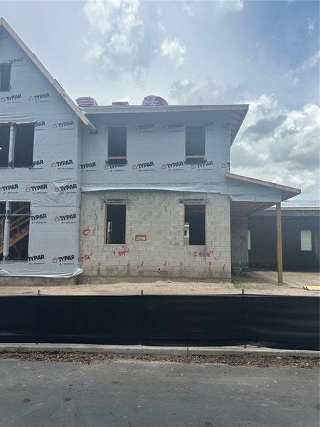 Front exterior of a new home in , Winter Garden, FL, highlighting curb appeal (Image 13).