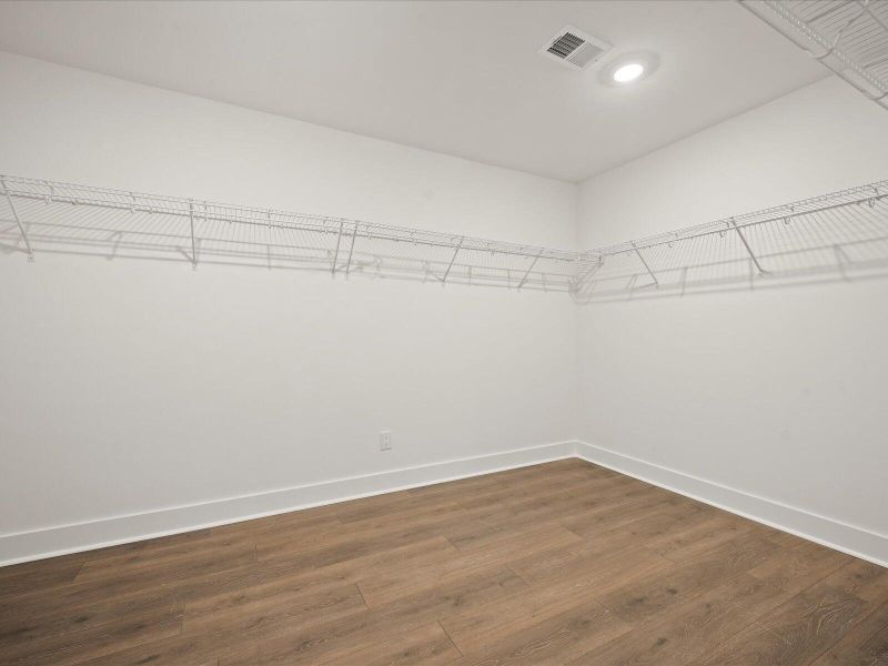 Spacious, unfurnished interior of a new home in The Coves at Lakes of Cane Bay, Summerville (Image 22). Spacious, unfurnished interior of a new home in The Coves at Lakes of Cane Bay, Summerville (Image 22).