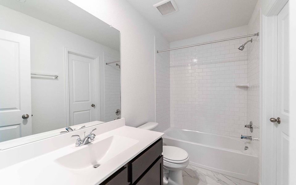 Furnished interior view inside a new home in Brooklands, Hutto (Image 3).