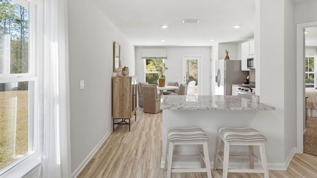 Furnished interior view inside a new home in Chateau Nemours, Port Saint Joe (Image 11).