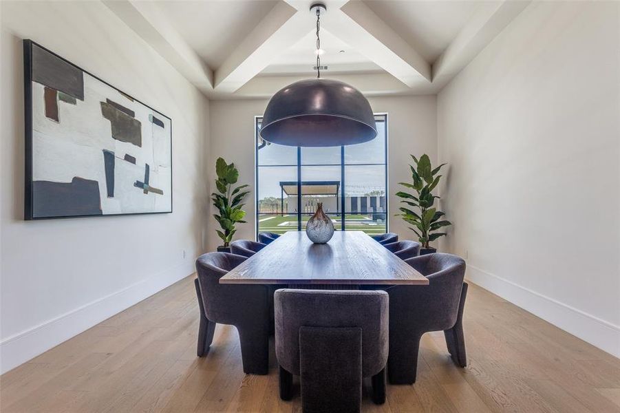 Dining room with wood-type flooring